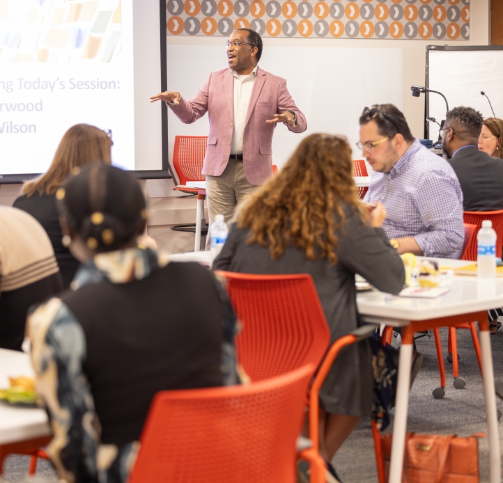people sitting in the brainstorming room working