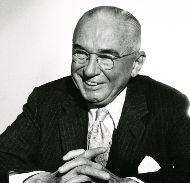 Black and white photo of alex osborn smiling