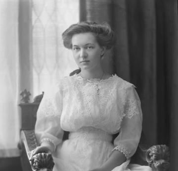 Osborn's wife, Helen sitting in a chair age 17