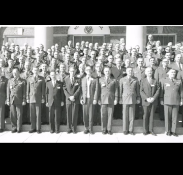 Military men lined up for photo to document their creative problem solving institute 