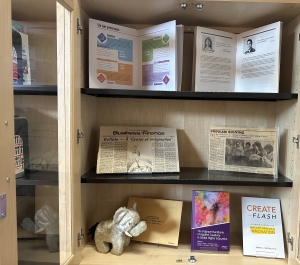 Modern contributions to creativity featuring books, and elephant stuffed animal 
