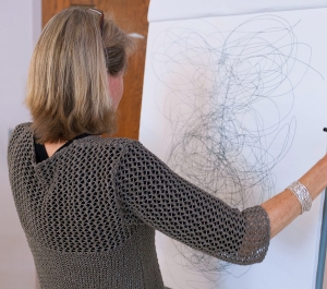 Creativity student at an easel